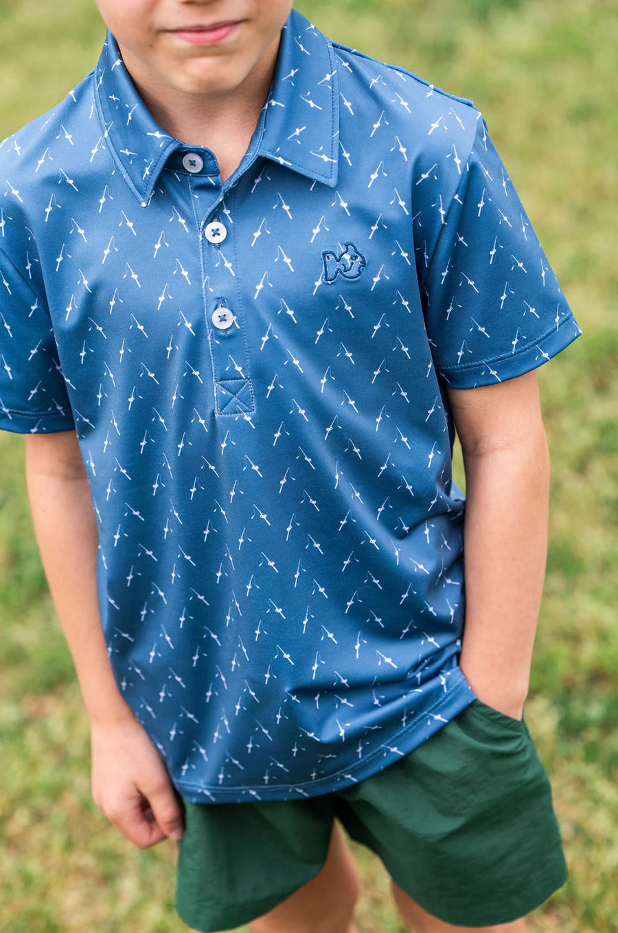 Boy's Short Sleeve Pro Perf Polo in Fishing Rod Print- Blue